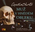 Muž v hnědém obleku